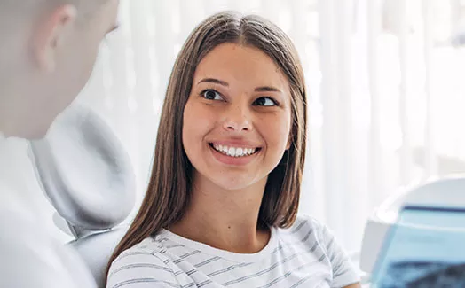 Woman at dental hygiene appointment